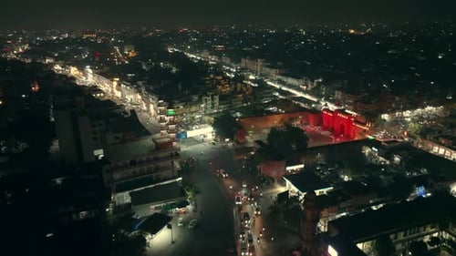 Aerial view of lit buildings and streets, Ashok Nagar, India.