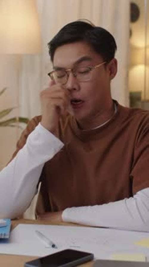 Student Falling Asleep Preparing for Upcoming Exams at Home