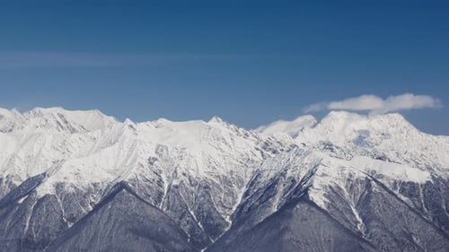 Winter Mountain Landscape Majestic Panorama of Snowcovered Caucasus Mountains Showcasing Stunning