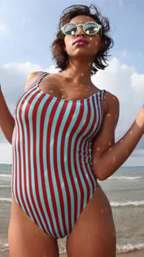 Female Dancerat the Beach in Vertical Format