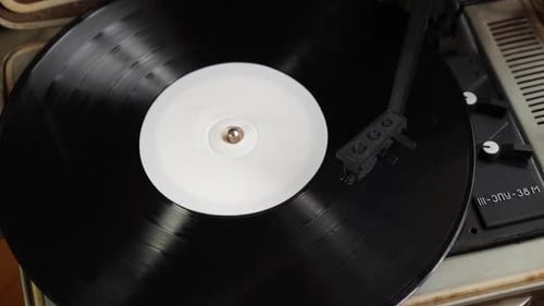 65. Vinyl player. Needle player close up. Retro vinyl record player.