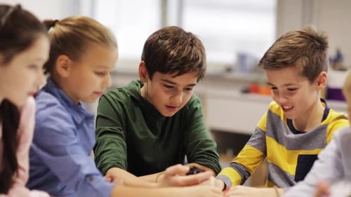 Children Learning About Technology and Robotics at School