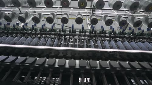 Spinning Factory Production of Fabrics Thread of Silk Linen and Synthetics View of Spools of Thread