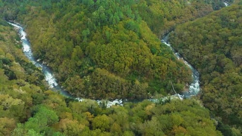Drone View Of A River In Lush Valley At Fervenza do Toxa In Pontevedra, Galicia Spain.