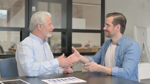 Old Businessman Gives Money and Shakes Hand with Young Man