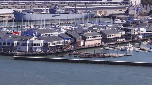 Aerial View of San Francisco Waterfront and Pier 39 with Naval Ship
