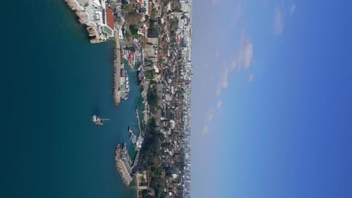 Vertical Aerial Shot the Camera Flies Up to the Old City of Antalya From the Sea