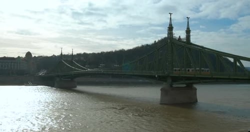 City Traffic on Liberty Bridge on Sunny Sky