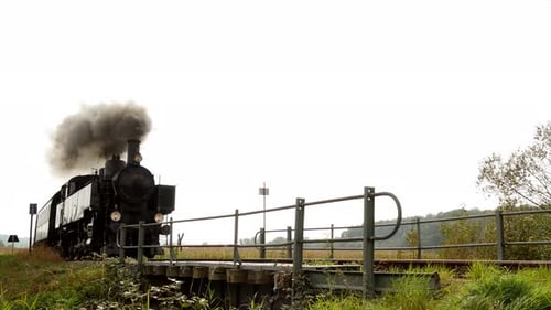 Industrial Steam Engine Locomotive Train Crossing Railroad Tracks