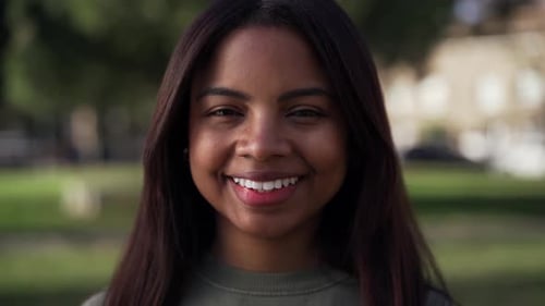 Close Up Head Shot Beautiful African American Teen School Girl Single Smile Looking at Camera
