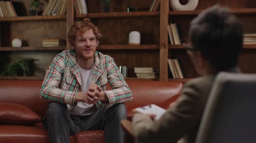 Man Speaking in Therapy Session With Therapist