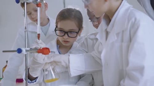 Children Doing a Science Experiment in Lab