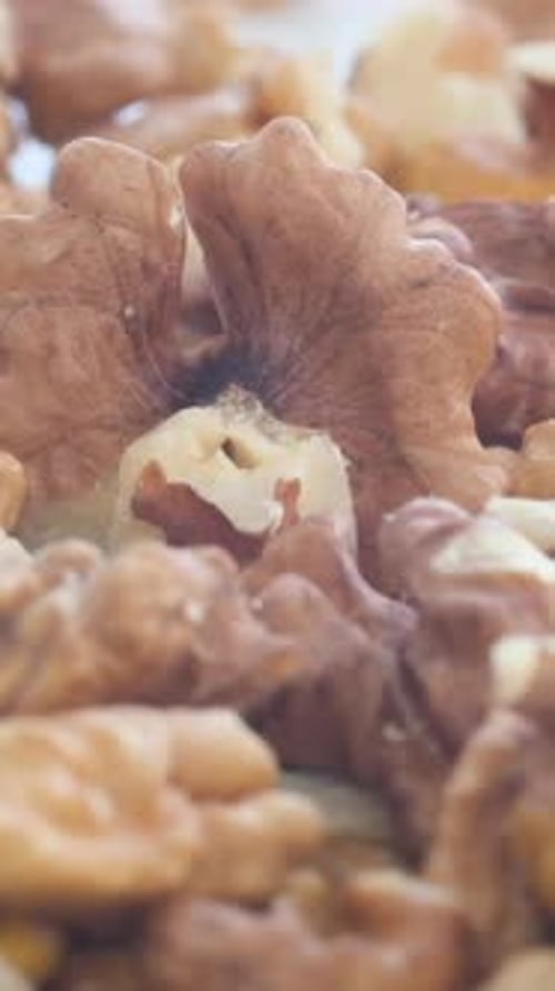 Dry Walnut Background Close Up Nut Rotation Food Background Vertical Video