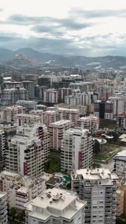 Vertical Video Coastal Chaos Aerial View of Stormy Mediterranean Coastline and Urban Panorama