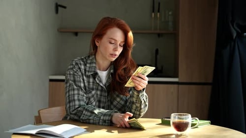 Depressed Desperate Woman Counting Dollar Bills and Feeling Worried About Financial Problem Stressed