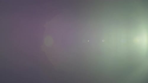 Lucent Precise Collection: A big blue lens flare appearing at the center over a black background cap