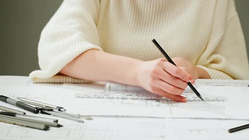 Architect Designer Drawing Plan Blueprint Closeup