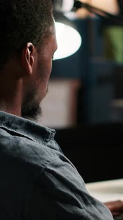 Vertical Video Male Developer Entering Binary Data on Terminal Panel While Writing Html Code