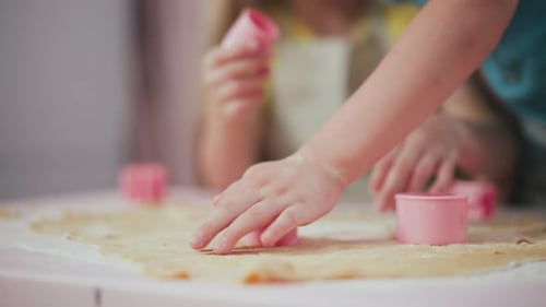Kids Baking Cookies with Cookie Cutters