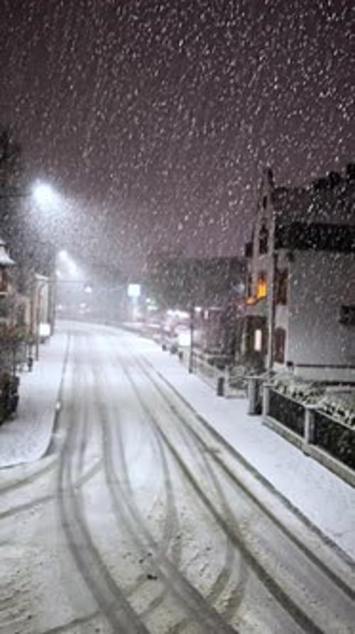 Silent Snowcovered Street Nighttime Winter Scene with Snowfall Calm Winter Night with Drifting Snow