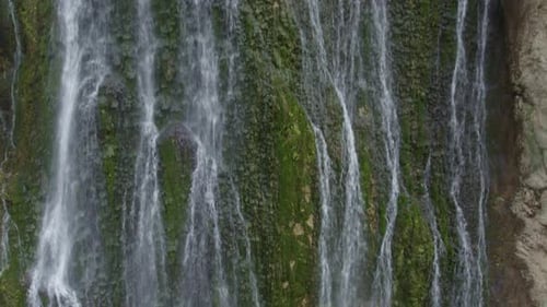 Pure, fresh water in a natural waterfall. Aerial view of the ascent. Granada. Spain.