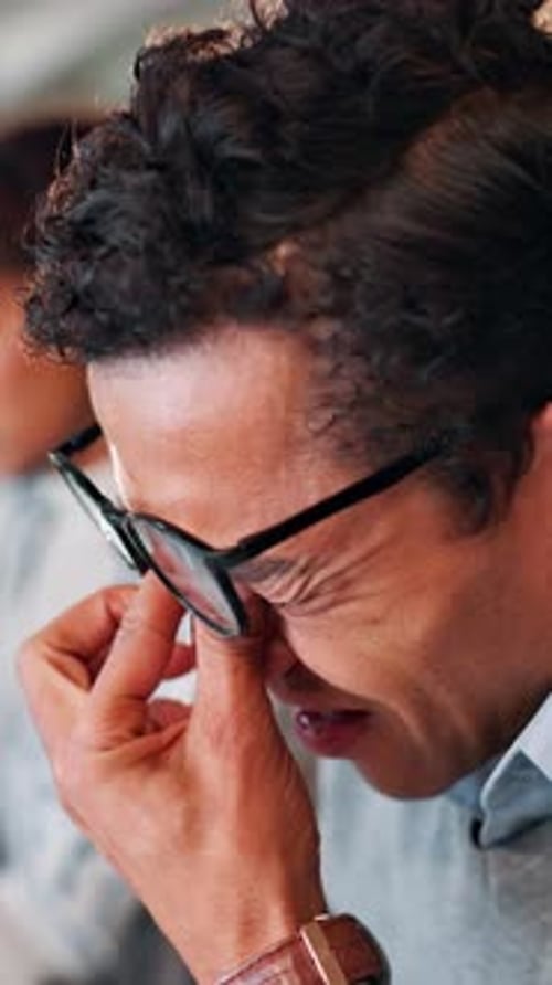 Business, man and tired with eye strain in office for article pressure, vision fatigue