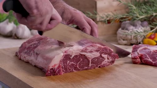 Luxury Steakhouse Chef Carving Premium Marbled Ribeye Steak