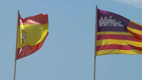 Spanish and Ibiza Flags Waving in Wind