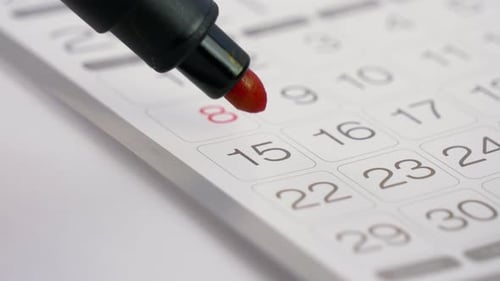 Date on Calendar Circled with Red Marker