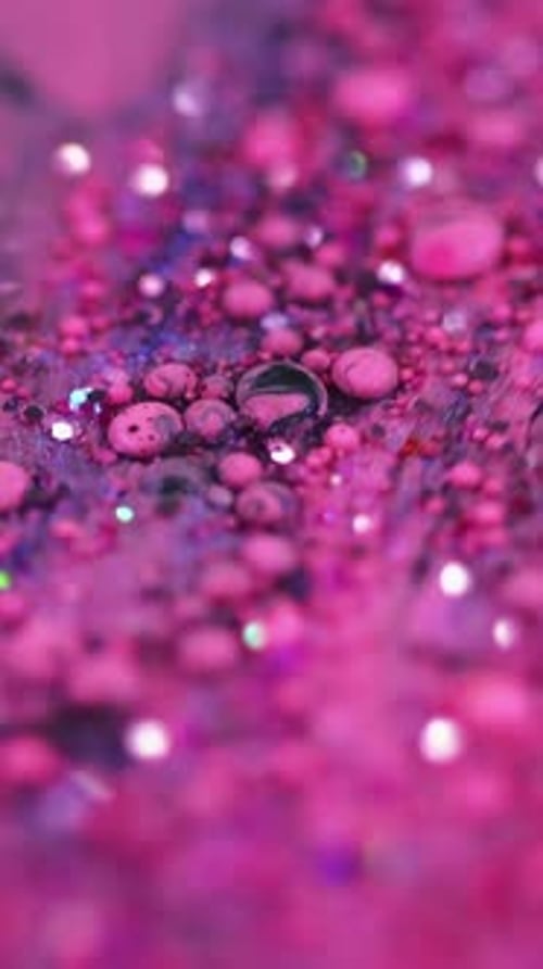 Swirling Pink Liquid Glitter Abstract Macro Shot