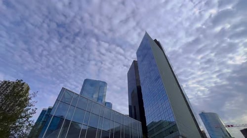 Modern Buildings Against Cloudy Sky in Urban Area