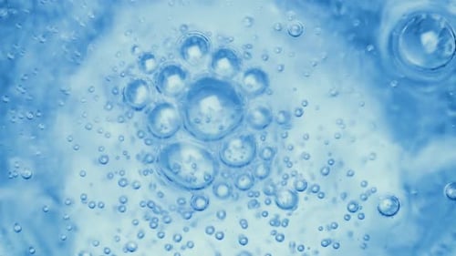 Blue Bubbles in a Translucent Liquid