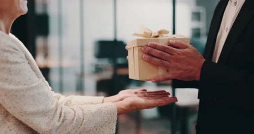 Box, gift and thank you with Japanese business people in office for birthday, event or respect