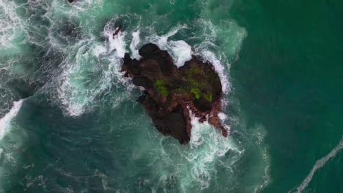 Aerial Top View Beautiful Ocean with Large Sea Wave Crashing on Rocks