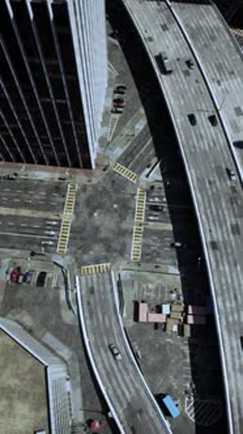 A Bustling Cityscape Seen From Above with Towering Skyscrapers and Busy Roads