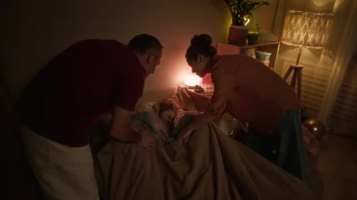 Parents Checking Sleeping Kid