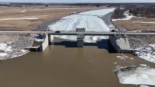 Red River Floodway Gates Winnipeg Manitoba Canada Aerial Drone Dronie Pullback Spring Break