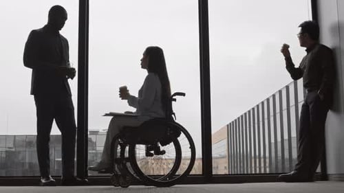 Business Team Meeting near Office Window