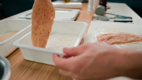Chef Preparing Meat in Restaurant Kitchen