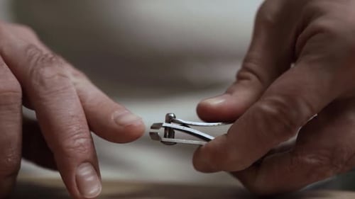 Man Cutting His Nails — Personal Grooming Moment