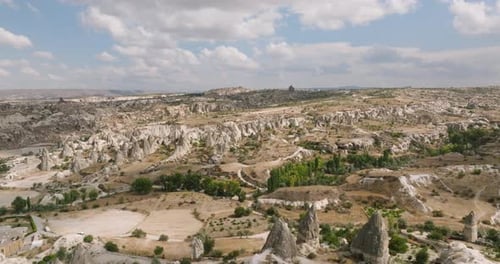 Aerial View of Cappadocia, Turkiye's Sculptural Peaks in Arid Splendor