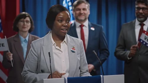 Woman Giving Political Speech at Podium