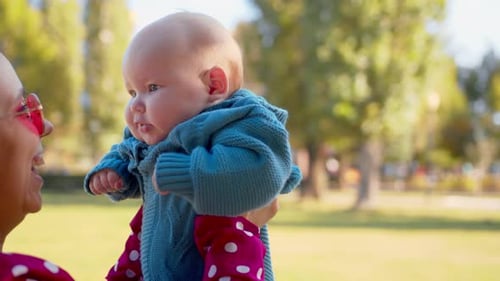 Mother and Baby in the Park The Concept of a Happy Family