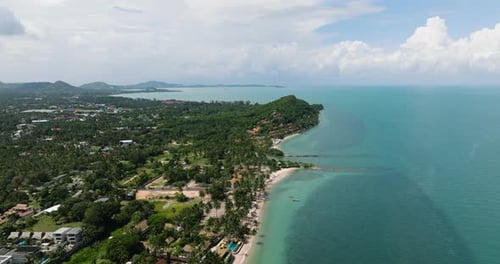 Tropical Coastline with White Sandy Beaches and Green Hills Ko Samui Thailand