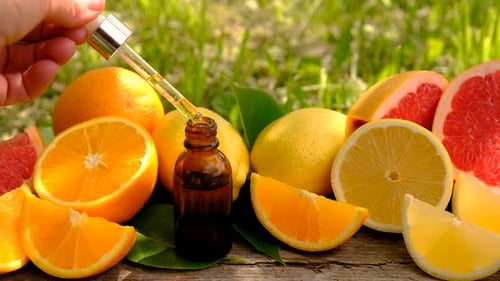 Essential Oil Extracted Among Citrus Fruits Outdoors