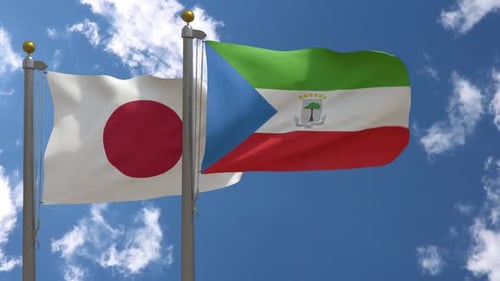 Flagge Japans gegen Äquatorialguinea Flagge am Fahnenmast