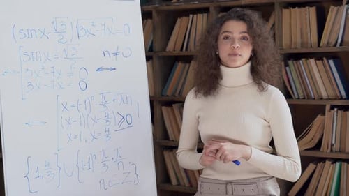 Hispanic School Teacher Give Math Class Look at Camera Explain Equation Point