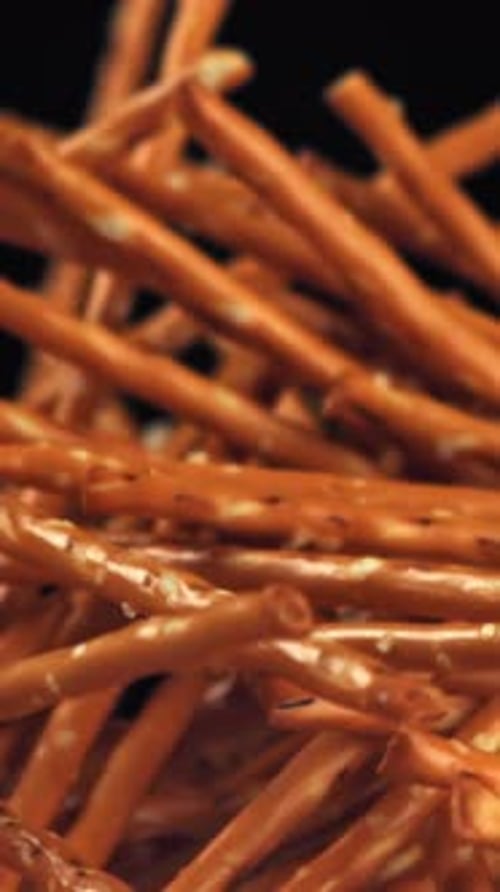 Salted Cracker Sticks Fly and Fall Filmed on a Highspeed Camera at 1000 Fps
