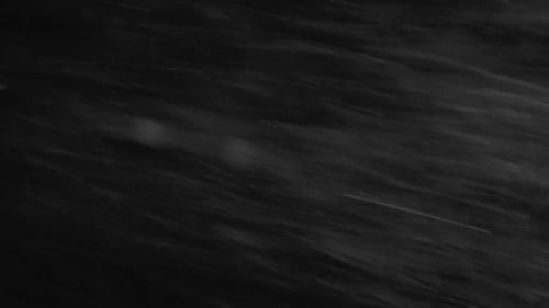 Snow Falling on Black Background for Compositing