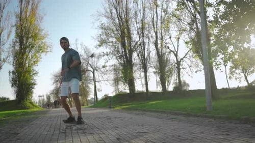 Skateboarder Riding Board in Park